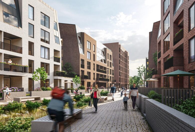 Modern residential area with people walking and biking on a sunny day. Brick and white buildings.