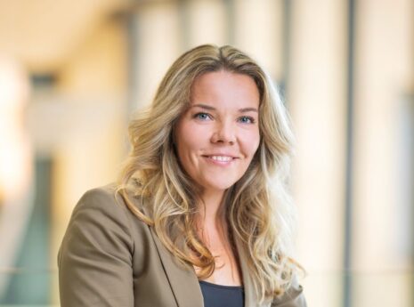 CSO Iida Vakkuri, smiling woman with long hair