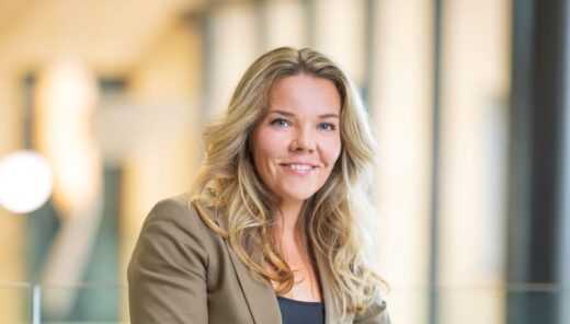 CSO Iida Vakkuri, smiling woman with long hair
