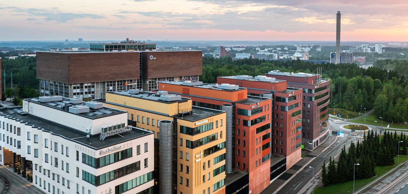Aerial view of modern office buildings in Tampere, Finland at sunset